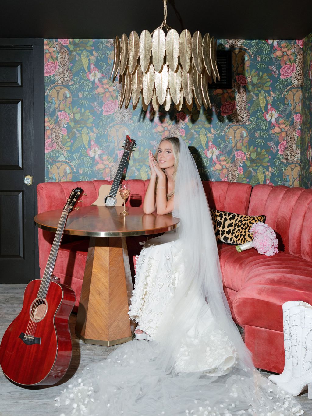 Image may contain Couch Furniture Face Head Person Photography Portrait Clothing Dress Fashion and Formal Wear