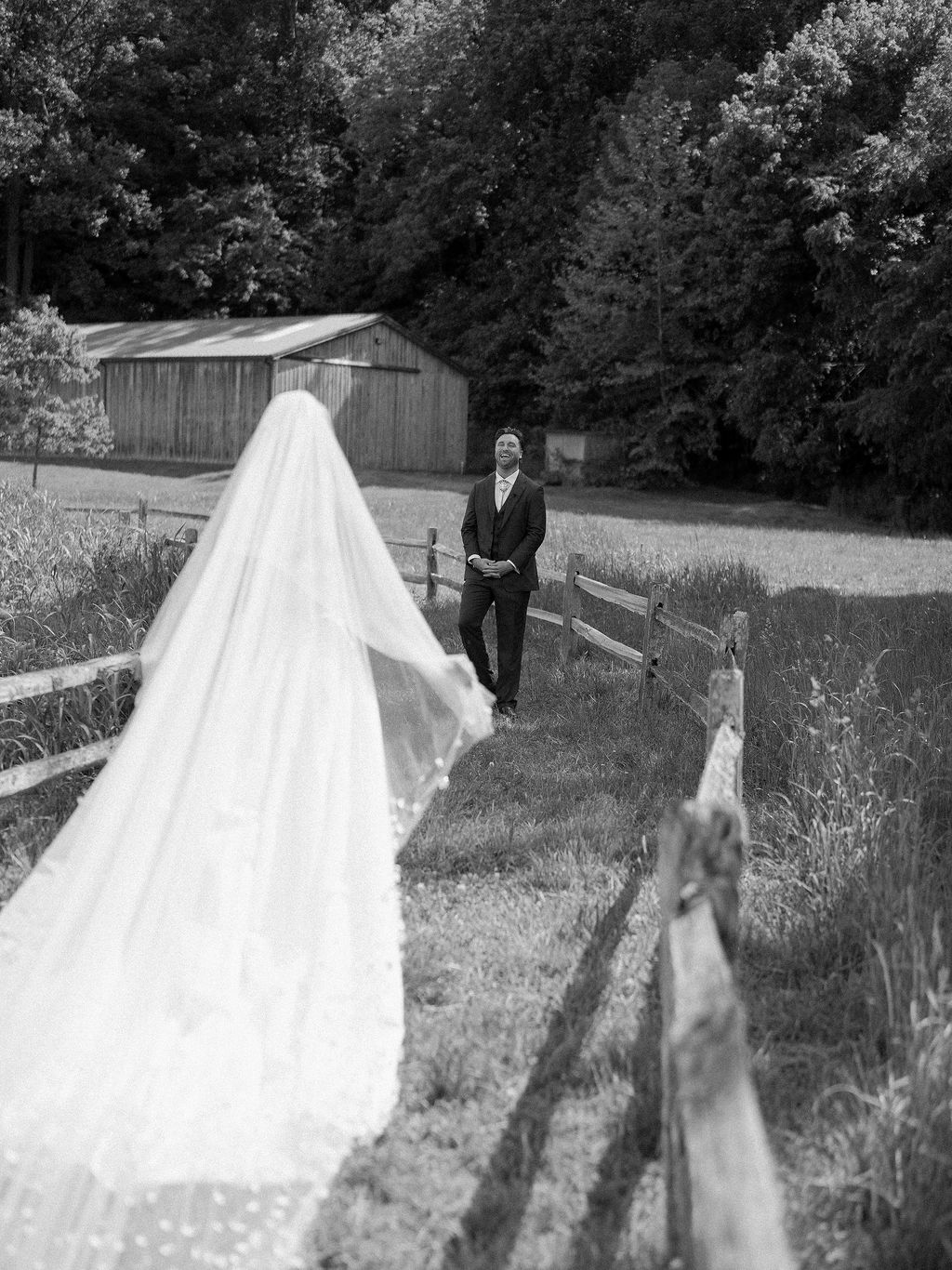 Image may contain Clothing Dress Formal Wear Suit Face Head Person Photography Portrait Fashion Gown and Wedding