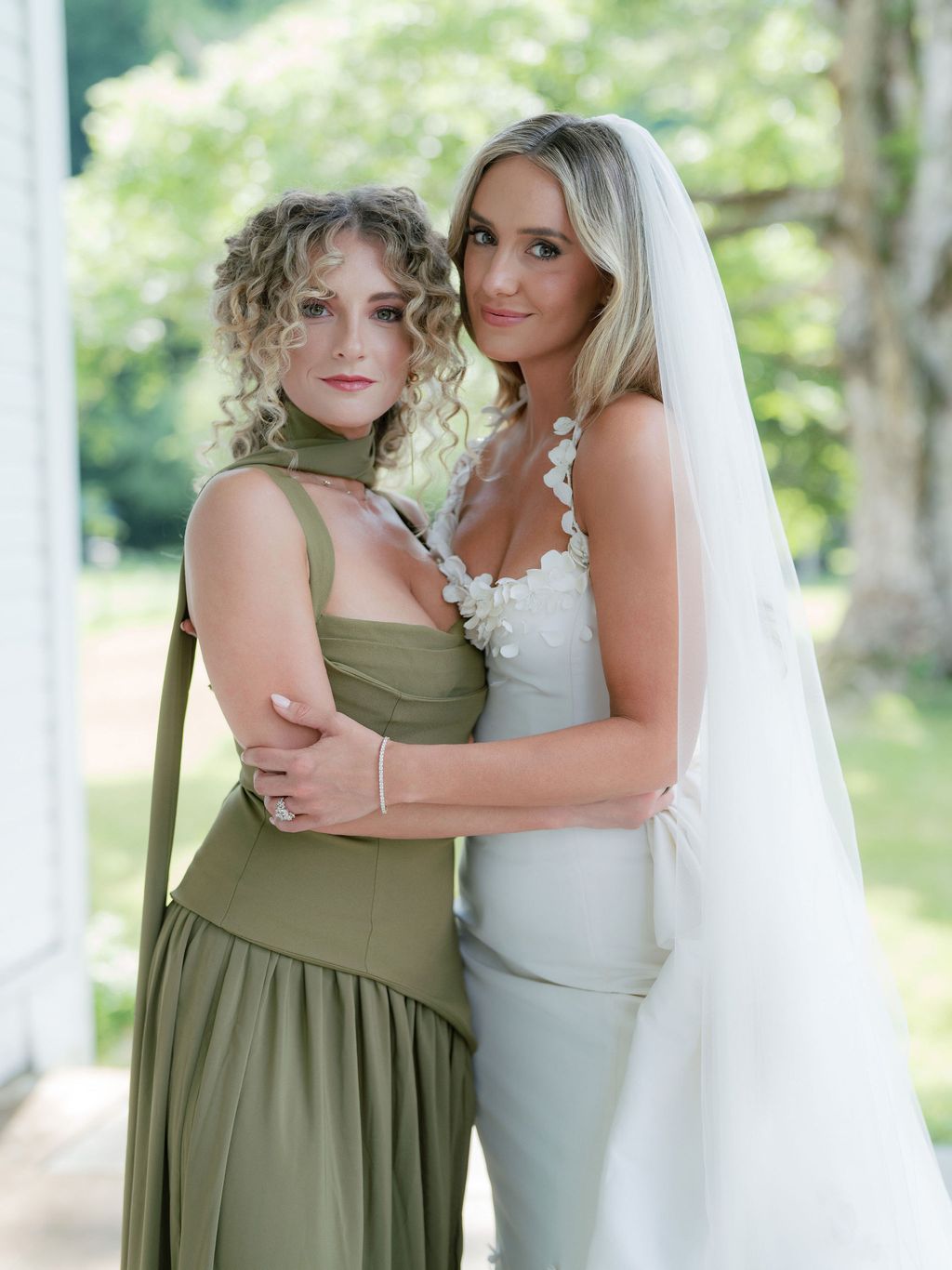 Image may contain Ève Angeli Clothing Dress Fashion Formal Wear Gown Wedding Wedding Gown Adult Person and Face