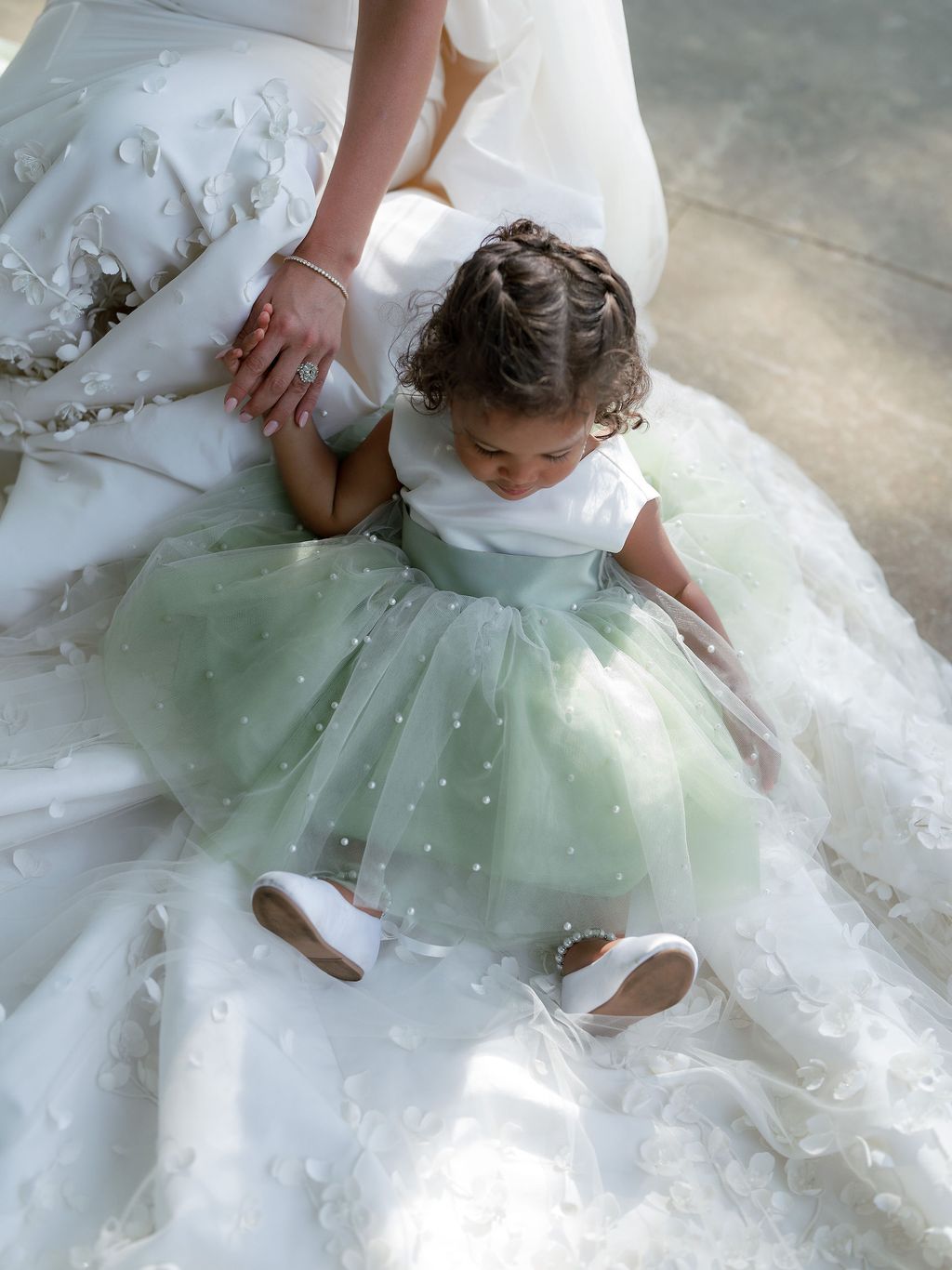 Image may contain Clothing Dress Formal Wear Fashion Gown Wedding Wedding Gown Adult Person Face and Head