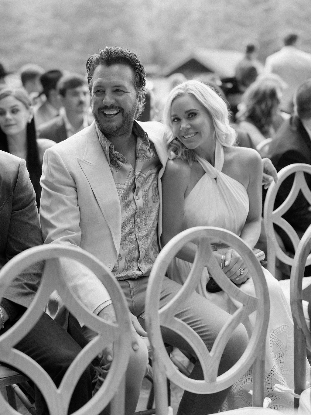 Image may contain Luke Bryan Face Happy Head Person Smile Formal Wear Clothing Dress Photography and Portrait