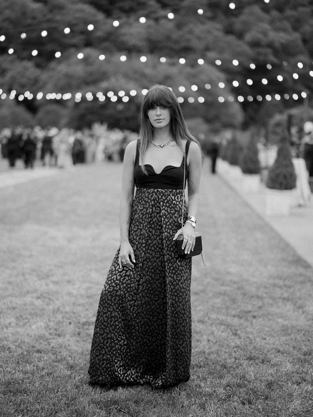 Image may contain Clothing Dress Accessories Bag Handbag Formal Wear Face Head Person Photography and Portrait