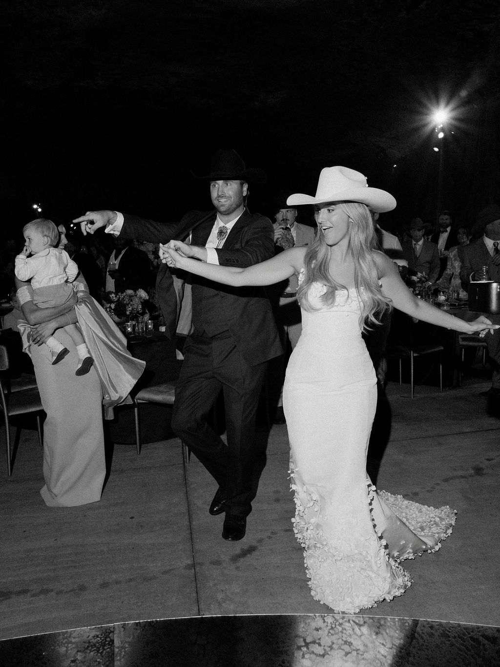 Image may contain Clothing Dress Formal Wear Hat Suit Fashion Gown Dancing Leisure Activities Person and Adult
