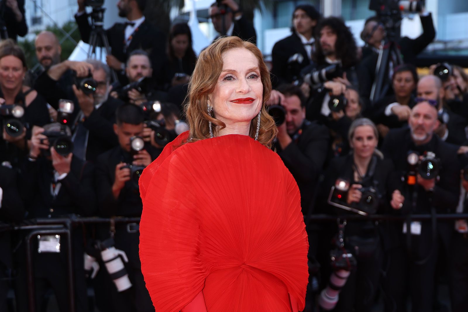 Image may contain: Isabelle Huppert, Anne-Marie Trevelyan, Delphine Batho, Jordi Cañas Pérez, Jonathan Cyprien, and Adult