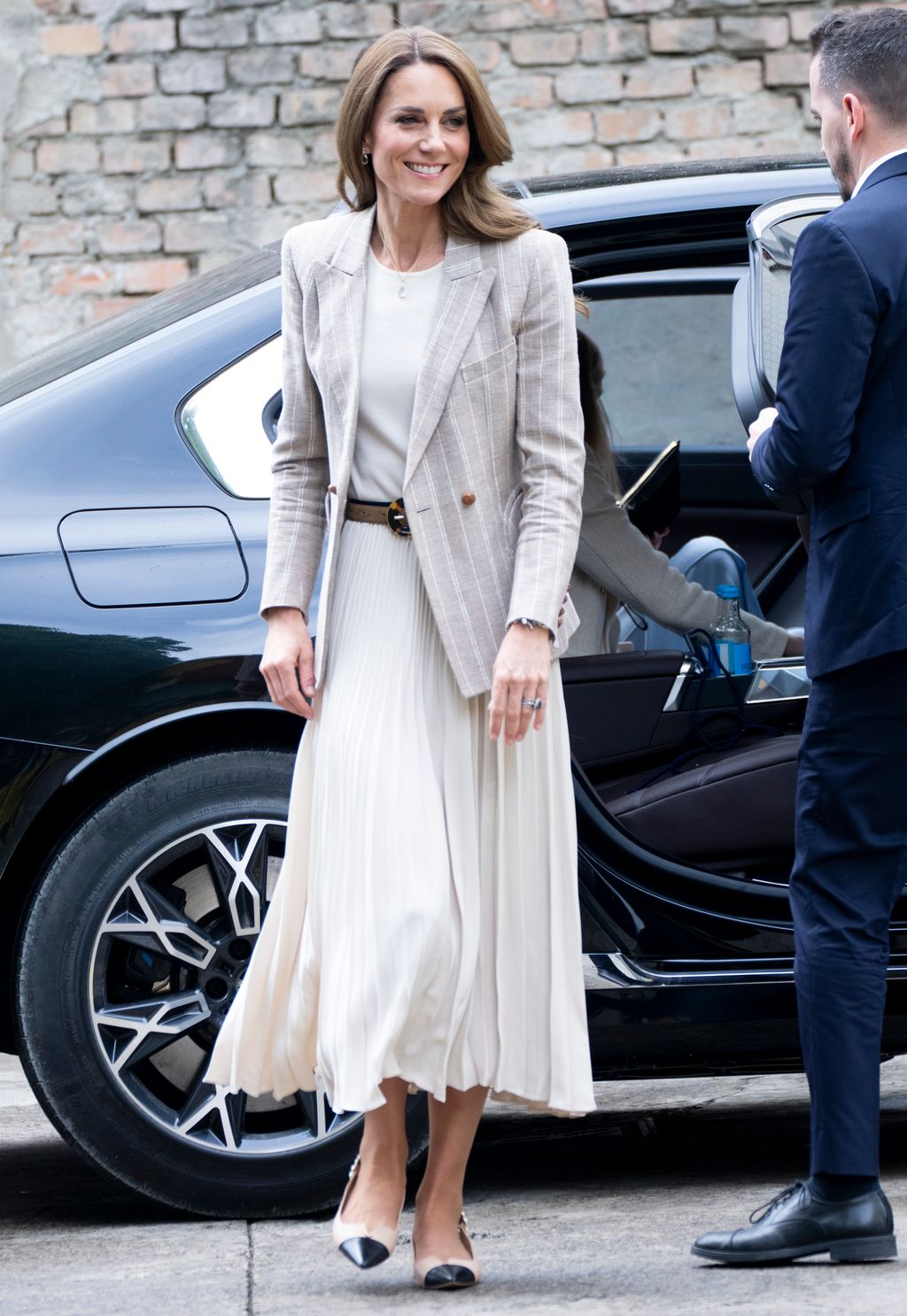Image may contain Person Adult Blazer Clothing Coat and Jacket