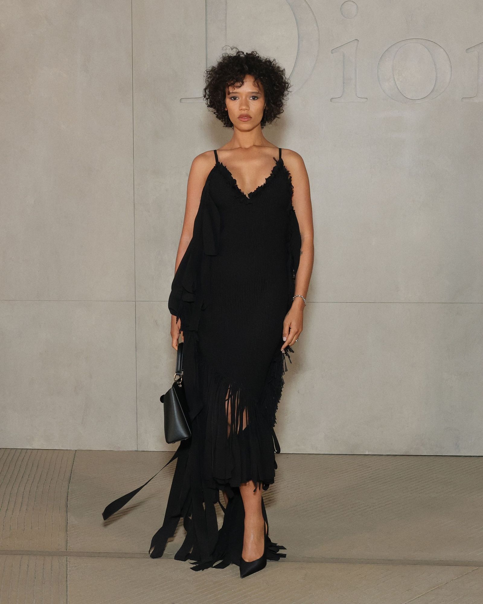 Image may contain Taylor Russell Clothing Dress Adult Person Formal Wear Footwear High Heel Shoe and Evening Dress