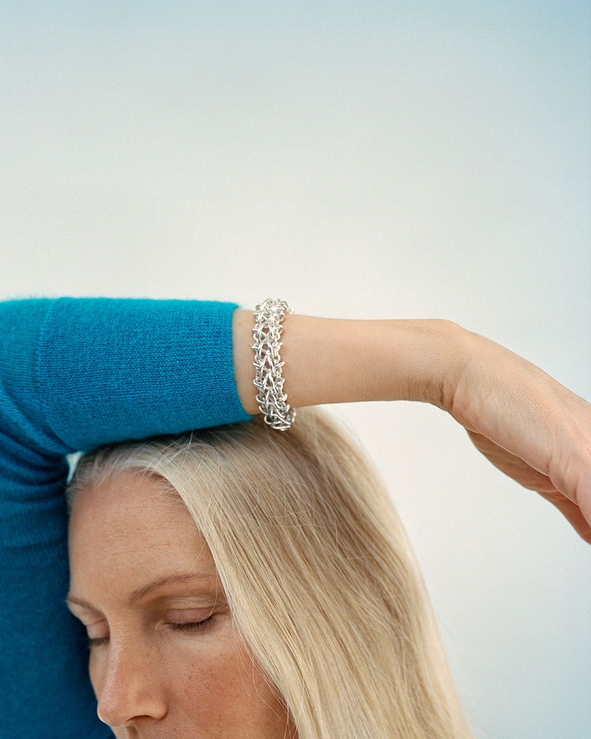 Image may contain Kirsty Hume Adult Person Accessories Bracelet Jewelry Cuff Arm and Body Part