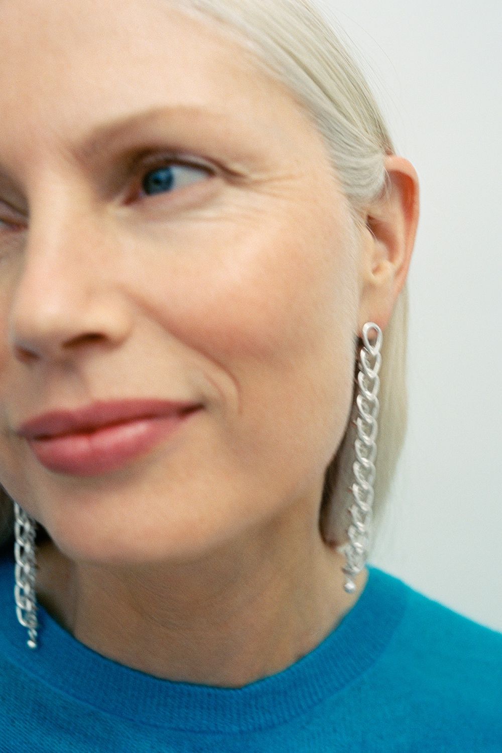 Image may contain Kirsty Hume Accessories Earring Jewelry Necklace Adult Person Face Head Photography and Portrait