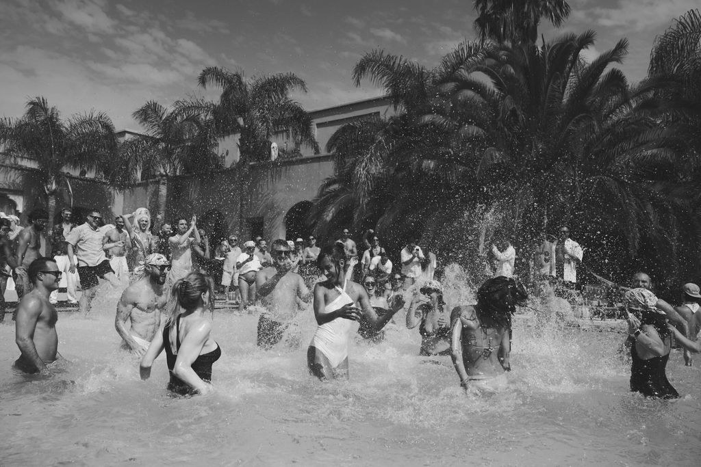 Image may contain Eric Carr Tom Mandrake People Person Adult Child Wedding Summer Water Pool and Bathing