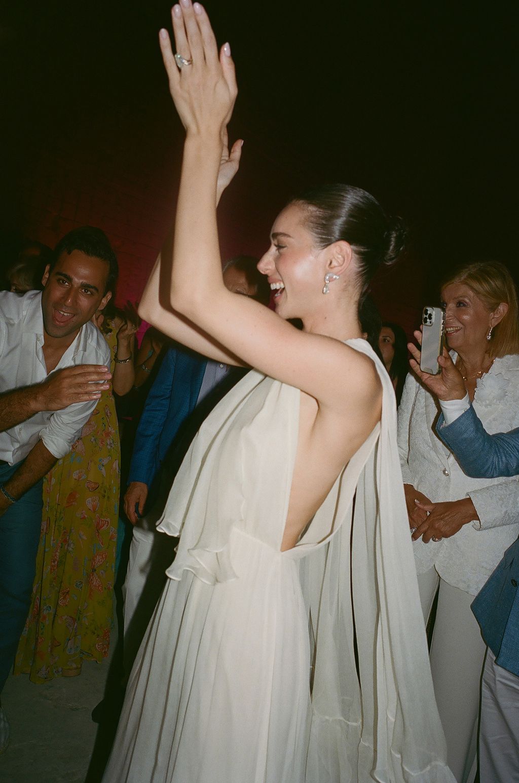 Image may contain Clothing Dress Person Photobombing Formal Wear Fashion Gown Wedding Wedding Gown Head and Adult