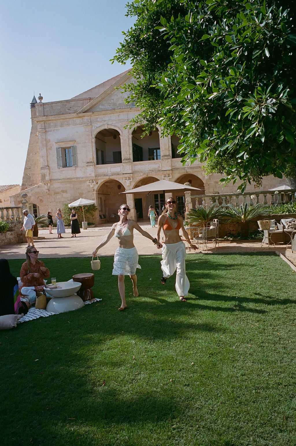 Image may contain Architecture Building House Housing Villa Grass Plant Potted Plant Backyard Nature and Outdoors