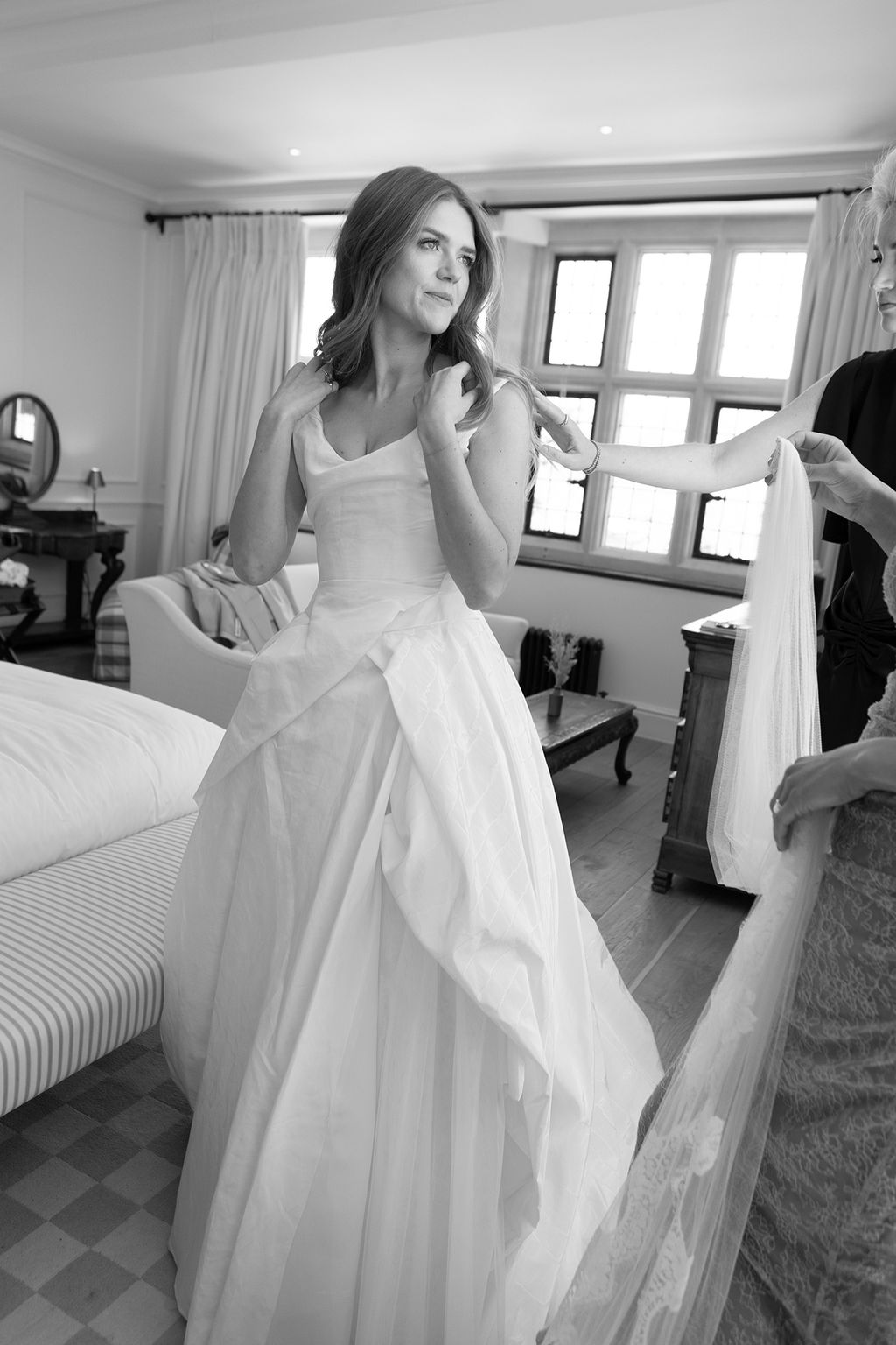 Image may contain Clothing Dress Formal Wear Fashion Gown Evening Dress Wedding Wedding Gown Couch and Furniture