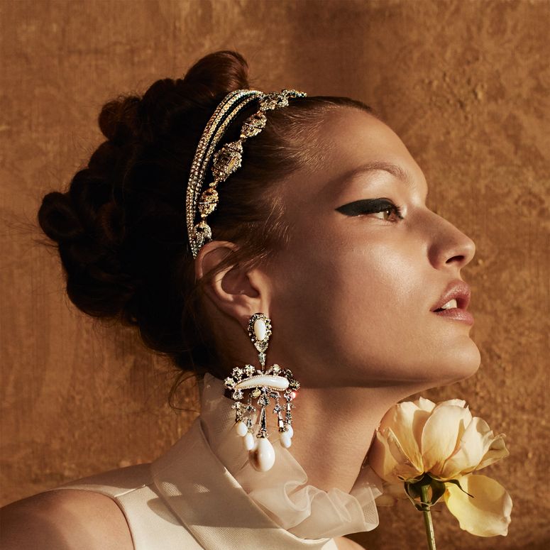Image may contain: Adult, Person, Wedding, Head, Flower, Plant, Rose, Face, Accessories, Photography, Portrait, and Earring