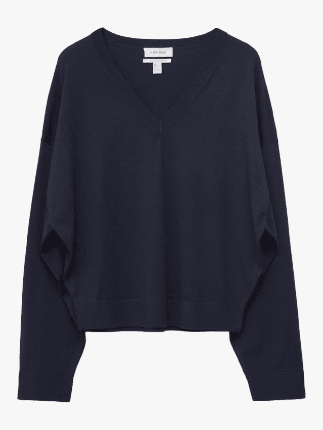 Image may contain Clothing Knitwear Sweater Sweatshirt Long Sleeve Sleeve Hoodie and Blouse