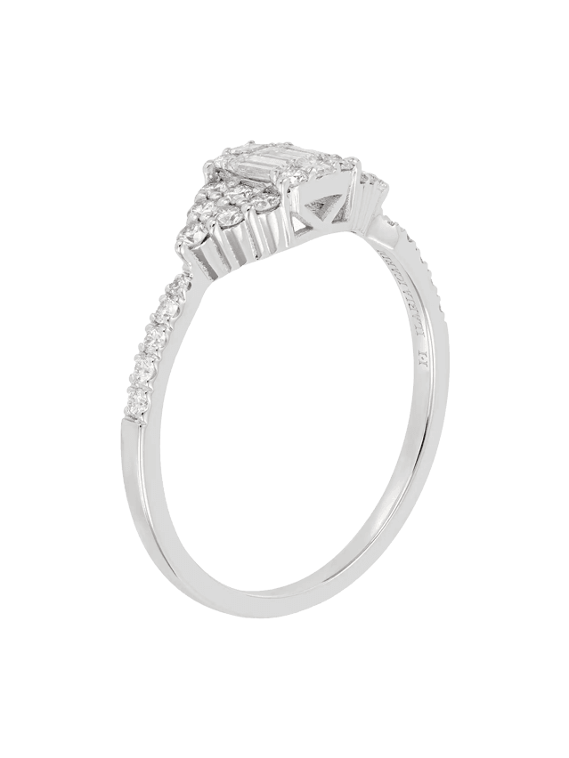 Image may contain: Silver, Accessories, Jewelry, Ring, Diamond, Gemstone, and Platinum