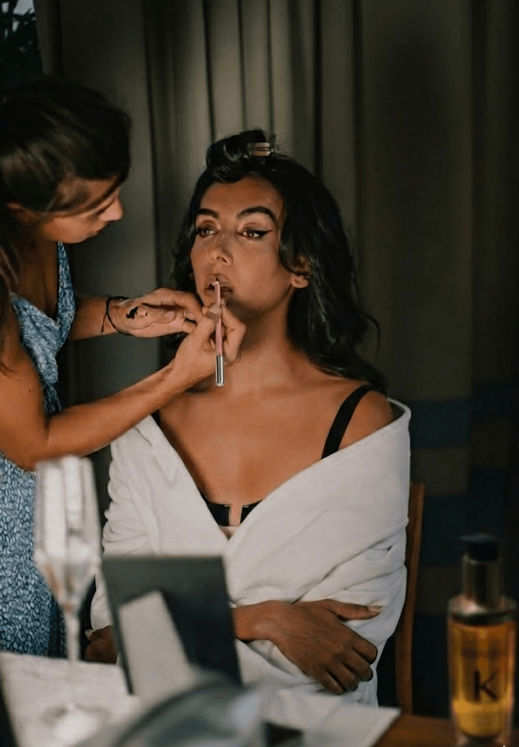 Image may contain Head Person Face Adult Cosmetics Smoke and Makeup